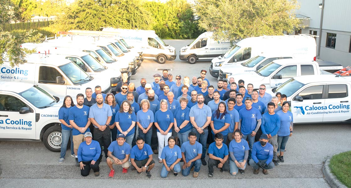 Caloosa Cooling Employees and Vans